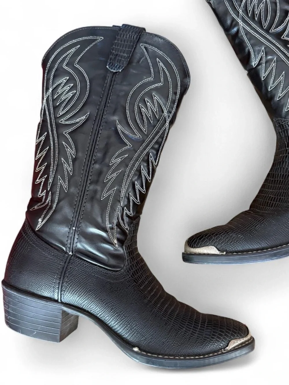Bronco black leather boots with silver toe embellishments
